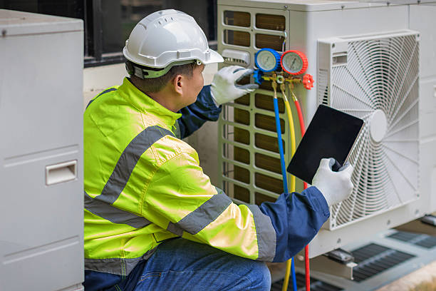 Professional Air Duct Cleaning technician working in Kenvil, NJ